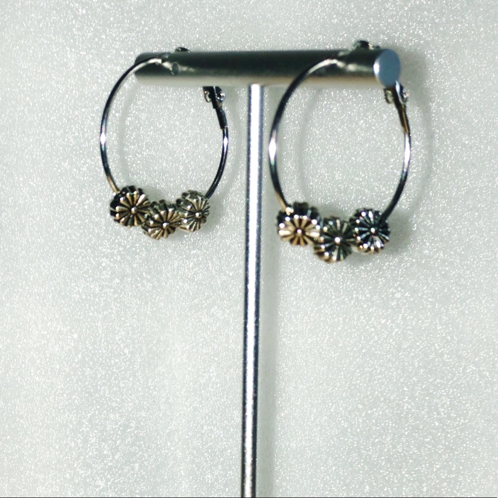 Silver flower hoops